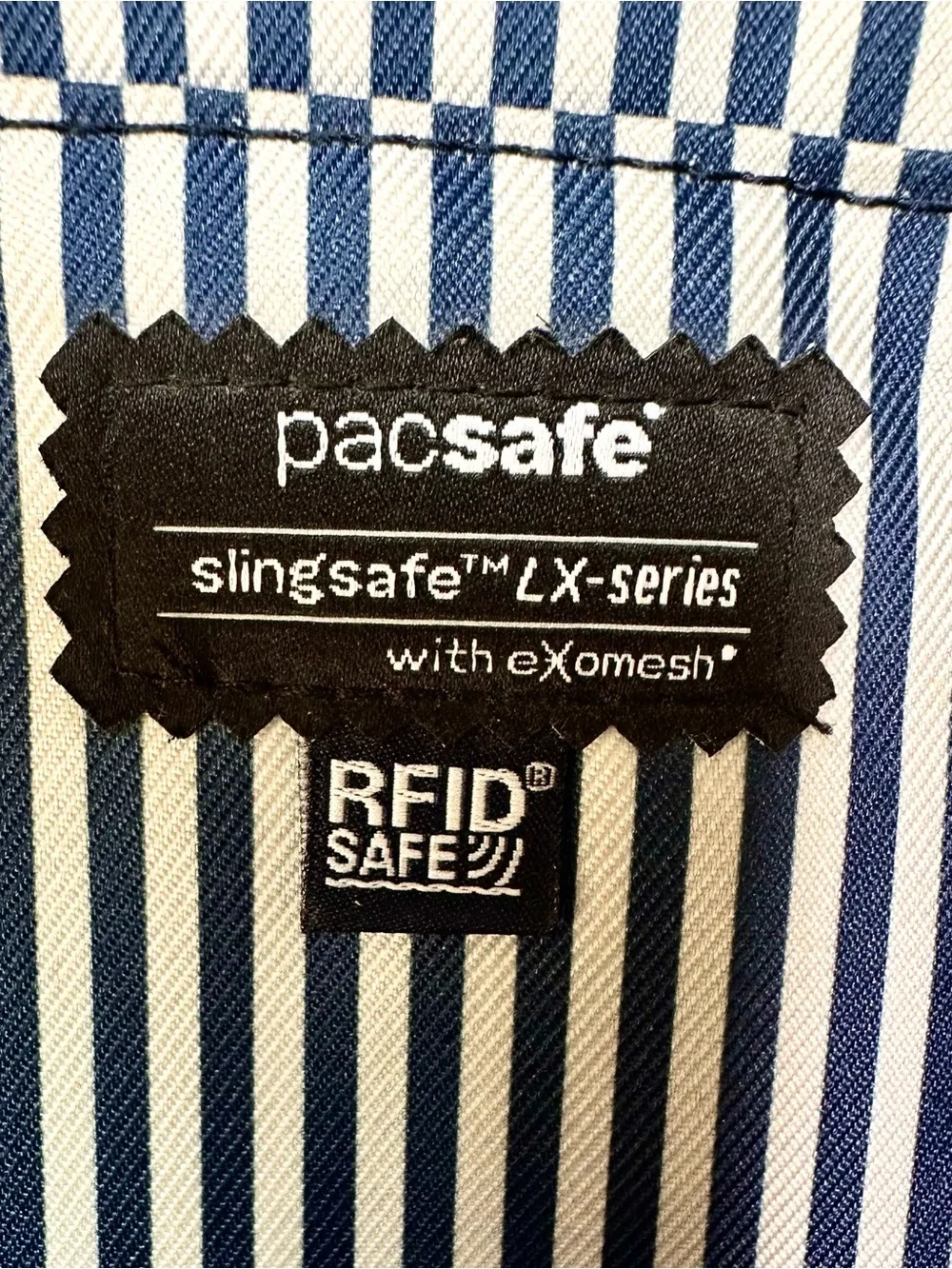 Pacsafe Unisex Slingsafe LX350 Anti-Theft Compact Backpack with Exomesh